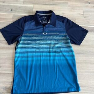 Oakley blue and white polo shirt with a sporty vibe sz S